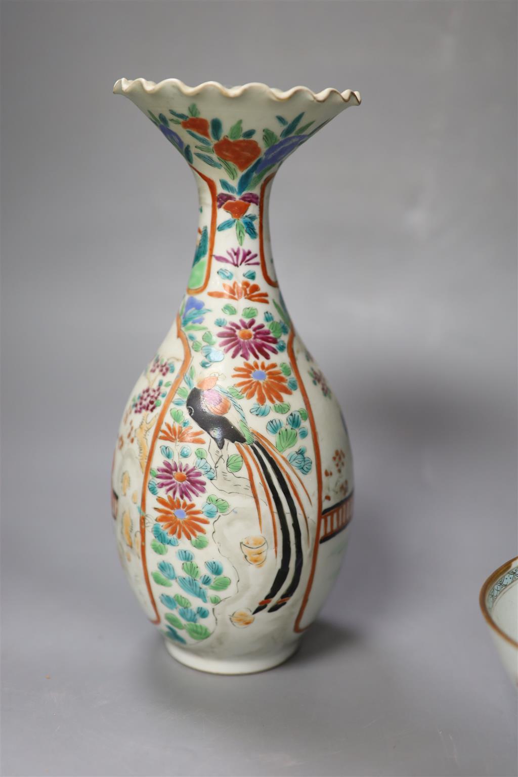 An 18th century Chinese famille rose bowl, a Japanese porcelain vase and and invalid cup, tallest 27.5cm